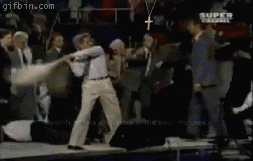 1255365820_beating-people-with-the-.gif